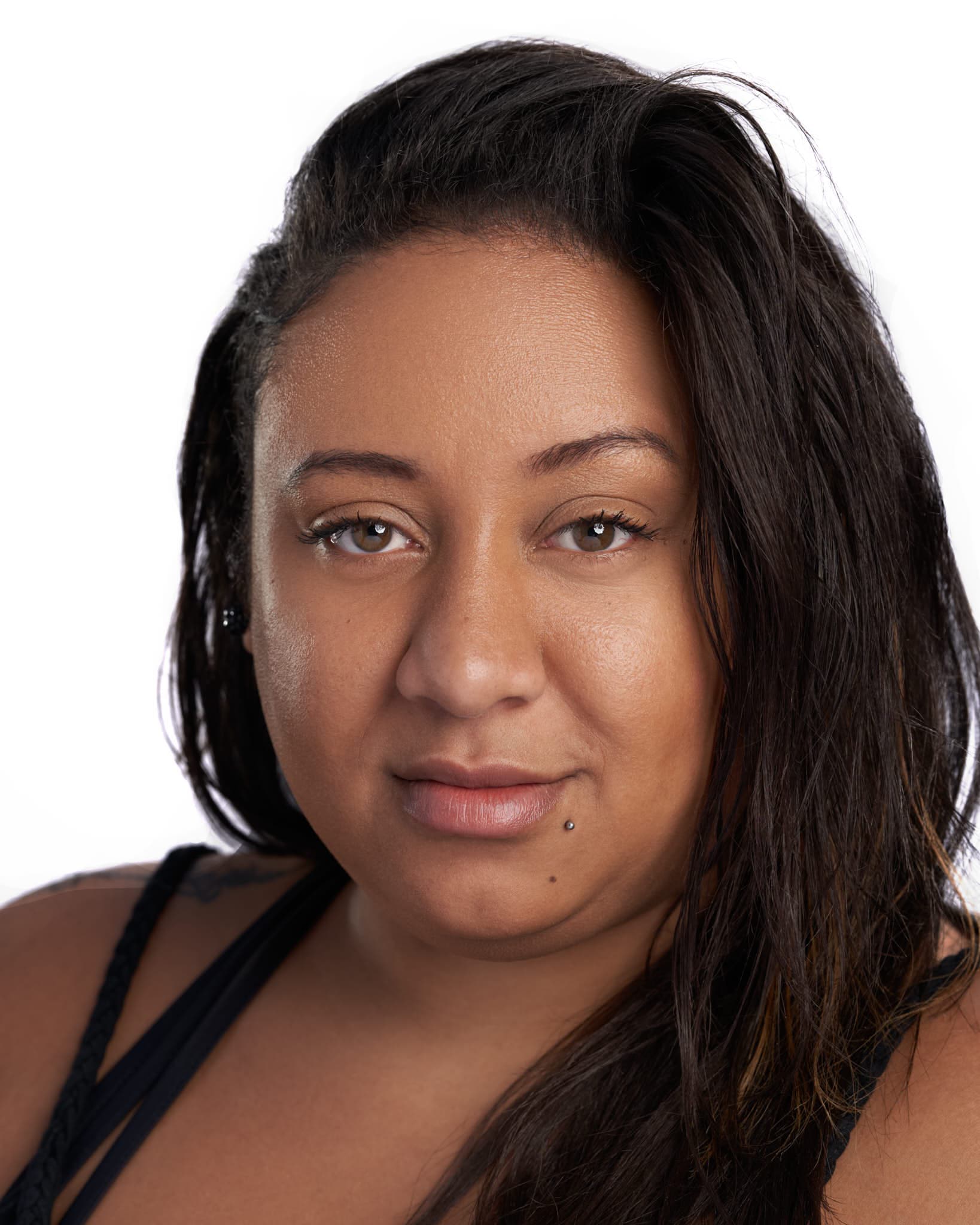 A portrait picture of a woman in white background