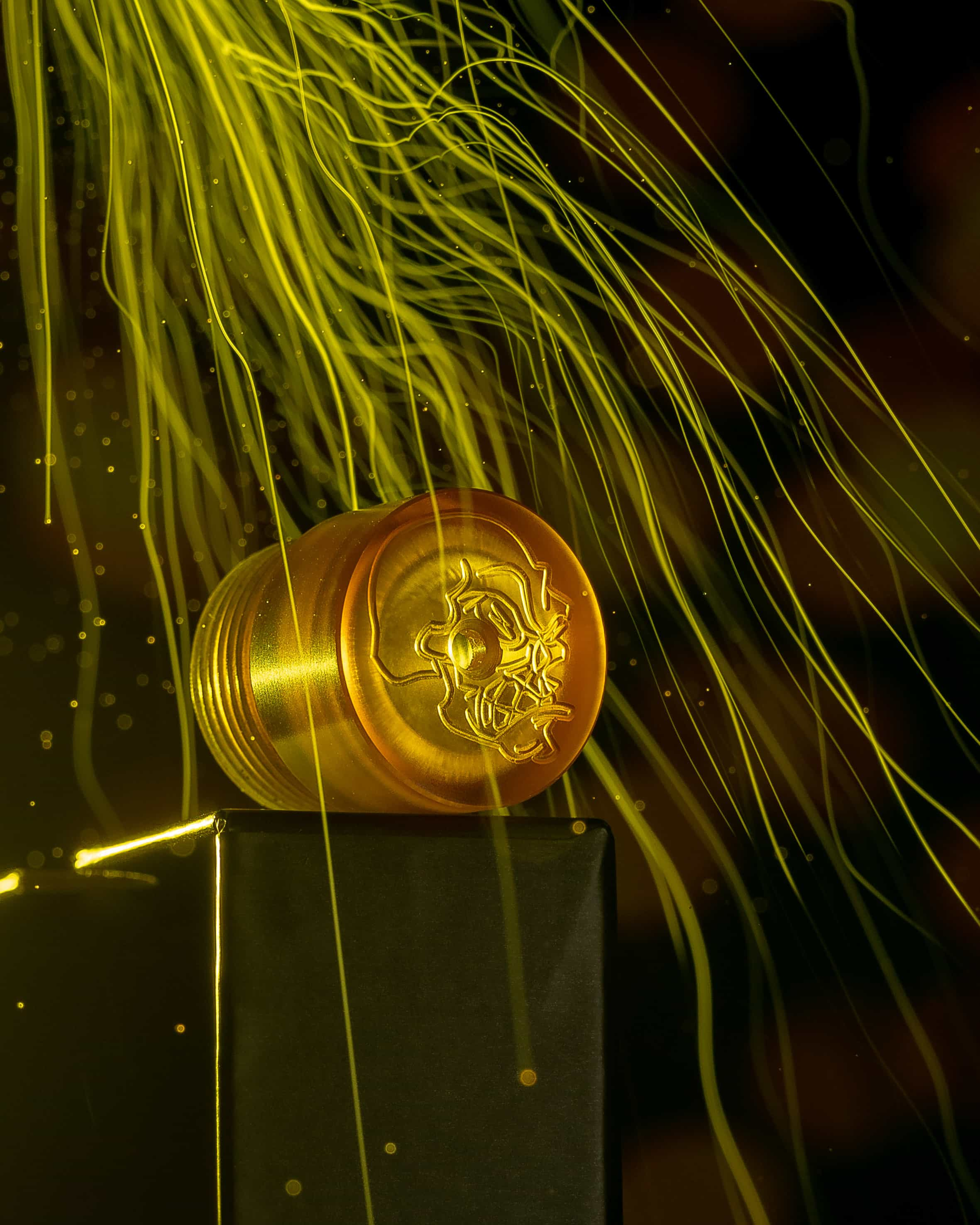 Electric cigarette vaporizer being flashed with yellow smoke like its radiated